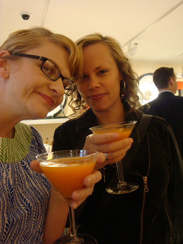 drinking orange fluids at the CB2 opening with Jill